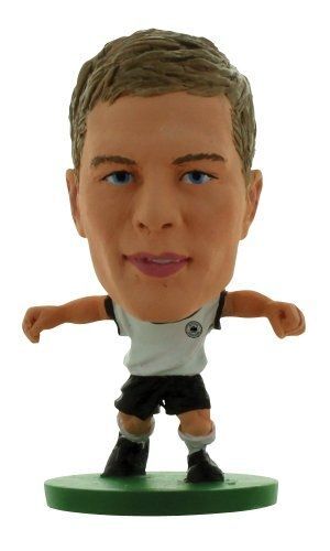 Soccerstarz - 400367 - Figurine Sport - Holger Badstuber Dans Sa Tenue D'équipe D'allemagne À Domicile