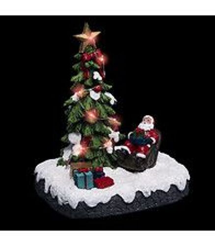 Village de Noël lumineux Père noël dans son fauteuil autour d'un sapin