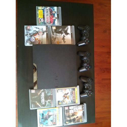 Console Ps3 Slim  + 3 Mannettes + 7 Jeux 