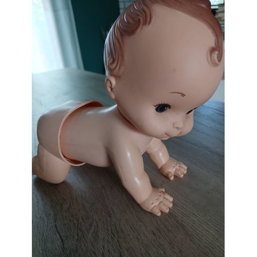 jouet des années 1980, bébé à pile qui fait du 4 pattes