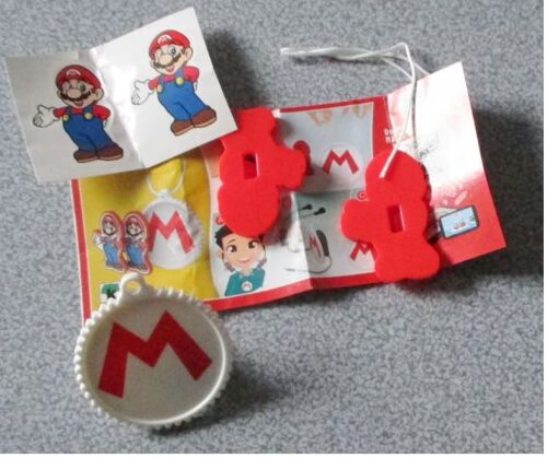 Figurine Kinder Joy À Monter - Série Super Mario Attaches Écouteurs Mario 2020 - Dv556 Mario - Avec La Fiche Bpz - En Vrac Dans Un Sachet Cellophane
