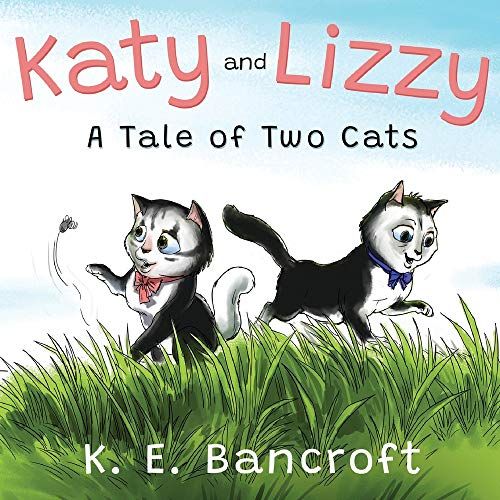 Katy And Lizzy (A Tale Of Two Cats)