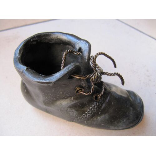 Chaussure Pyrogene En Metal En Tres Bon État