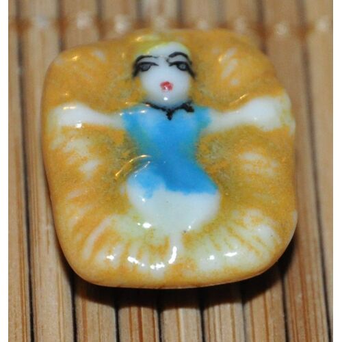 Feve En Porcelaine - Enfant Jesus Dans Son Berceau -