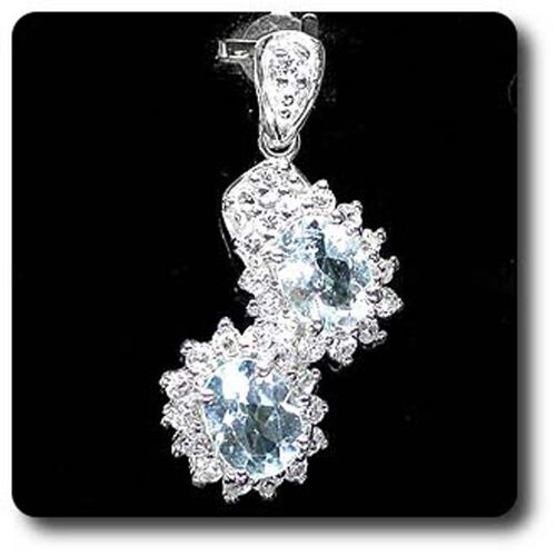 Pendentif Topaze Bleu Argent 925 + Plaqué Or Blanc 14 K.