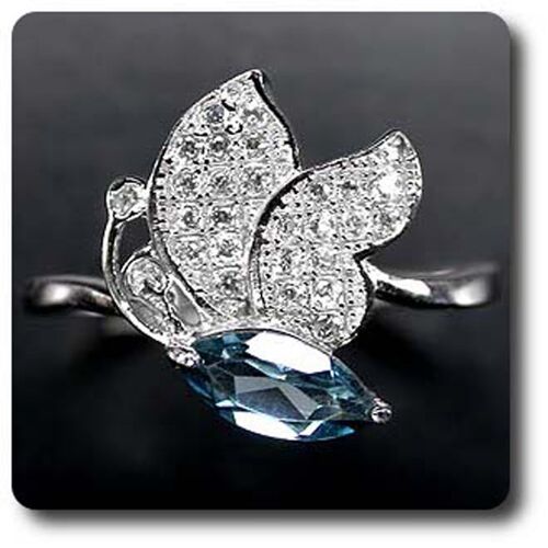 Bague Topaze Bleu Argent 925 + Plaqué Or Blanc 14 K . En Forme De Papillon.