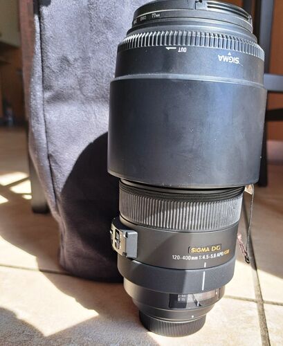 Objectif Sigma - Fonction Zoom - 120 mm - 400 mm - f/4.5-5.6 APO DG OS HSM - Nikon F + Etui + Pare-soleil + Collier de pied
