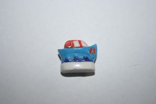 Fève Petit Bateau Sur La Mer