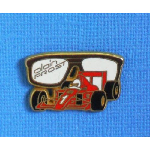 16721 // 1 Pin's : Formule 1 Lunette Alain Prost Noire . (Pouilloux Arthus Bertrand Paris)