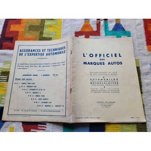 L' Officiel Des Marques Autos : Caractéristiques Et Prix De Tous Véhicules À Moteur ( Automobiles, Véhicules Industriels, Motocyclettes, Tracteurs Agricoles ). Editions : Numéro Après Salon 1967.