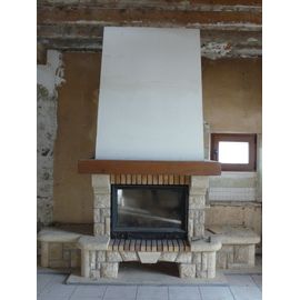 Cheminée insert Godin  en pierre du Gard