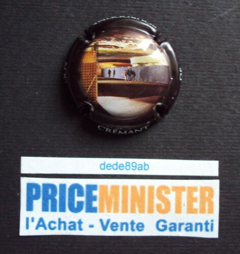 Capsule De Crémant De Bourgogne Des Caves Bailly Lapierre. Les Caves.