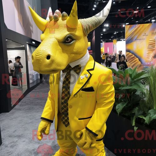 Costume Mascotte Redbrokoly De Triceratops Jaune Personnage Habillé D Un Blazer Et De Pinces À Cheveux