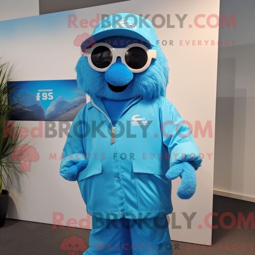Costume Mascotte Redbrokoly De Blue Cod Personnage Habillé D Un Coupe-Vent Et De Lunettes De Lecture