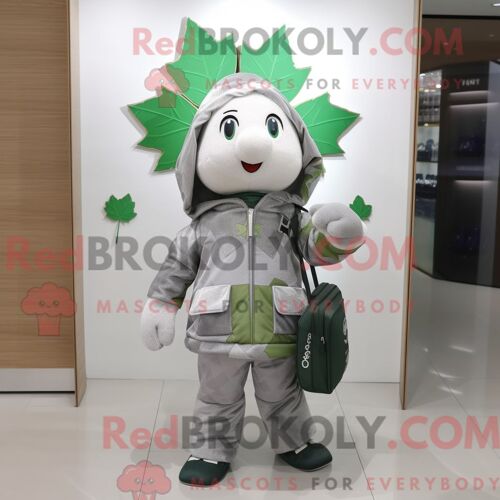 Personnage De Costume De Mascotte Redbrokoly De Trèfle À Quatre Feuilles Argenté Habillé Avec Un Sweat À Capuche Et Des Sacs Messager