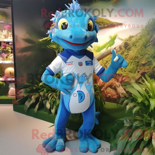 Costume Mascotte Redbrokoly De Geckos Bleus Personnage Habillé Avec Un Maillot De Rugby Et Des Pinces À Cheveux