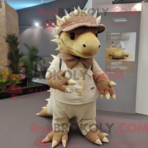 Costume De Mascotte Redbrokoly De Stégosaure Beige Personnage Habillé D Un Cardigan Et D Épingles À Chapeau