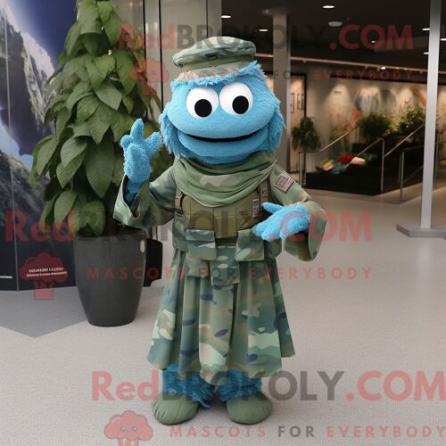 Costume Mascotte Redbrokoly De Béret Vert Bleu Ciel Personnage Habillé Avec Une Robe Et Des Foulards