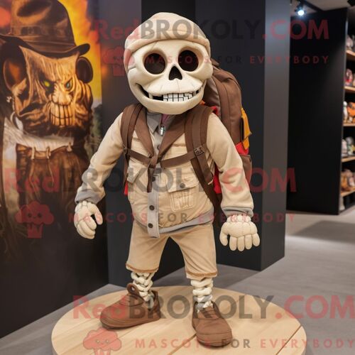Costume Mascotte Redbrokoly De Crâne Beige Habillé D Un Pantalon Et De Sacs À Dos En Velours Côtelé