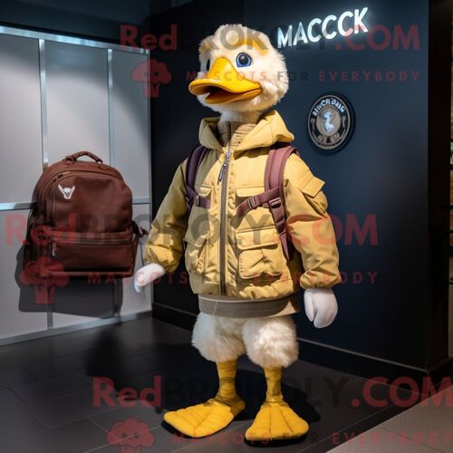 Costume De Mascotte Redbrokoly De Canard De Barbarie Doré Personnage Habillé D Un Blouson Aviateur Et De Sacs Messager