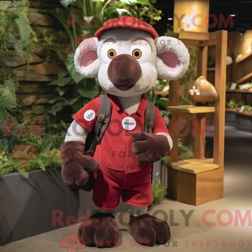 Mascotte Redbrokoly De Casque De Football Américain Turquoise Personnage Habillé Avec Une Veste De Costume Et Des Pinces À Chaussures