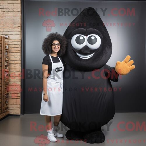Costume Mascotte Redbrokoly De Falafel Noir Personnage Habillé Avec Une Robe Droite Et Des Lunettes