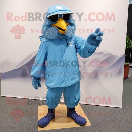 Personnage De Costume De Mascotte Redbrokoly De Corbeau Bleu Ciel Habillé D'un Coupe-Vent Et De Coussinets Pour Les Pieds
