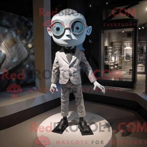 Costume De Mascotte Redbrokoly De Cyclope Argenté Personnage Habillé D Un T-Shirt Graphique Et De Noeuds Papillons