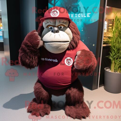 Costume De Mascotte Redbrokoly De Gorille Marron Habillé D Un T-Shirt Graphique Et De Bonnets