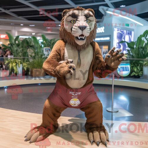 Costume Mascotte Redbrokoly De Smilodon Marron Personnage Habillé Avec Un Maillot De Bain Et Des Bagues