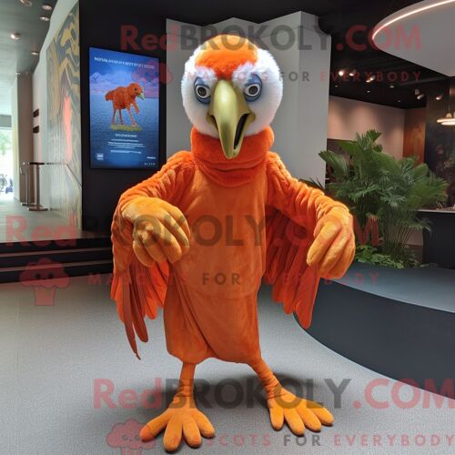 Costume Mascotte Redbrokoly De Vautour Orange Habillé D Une Combishort Et D Écharpes