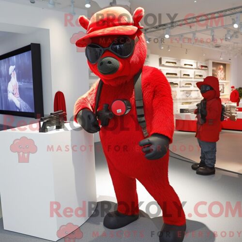 Costume Mascotte Redbrokoly De Chèvre Marron Habillé D Un Maillot De Bain Une Pièce Et De Ceintures