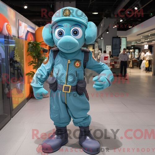 Personnage De Costume De Mascotte Redbrokoly Cyan Special Air Service Habillé Avec Un Pantalon Chino Et Des Pinces À Chaussures