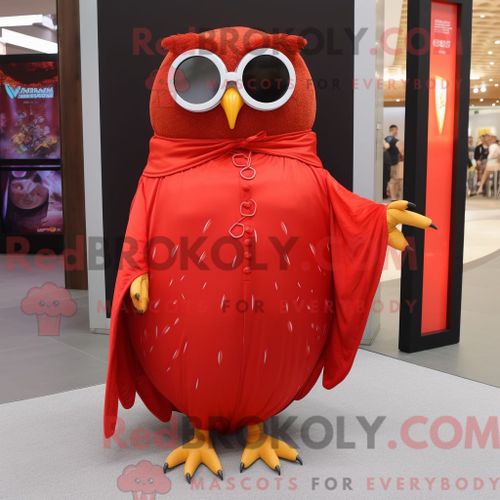 Costume Mascotte Redbrokoly De Hibou Rouge Habillé Avec Une Jupe Longue Et Des Lunettes De Soleil