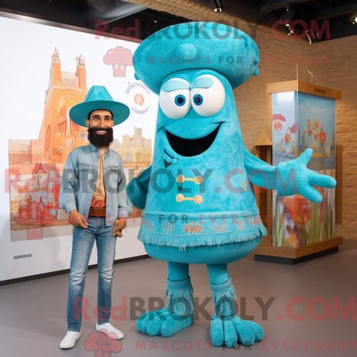 Costume Mascotte Redbrokoly De Paella Turquoise Personnage Habillé Avec Un Jean Boyfriend Et Des Broches