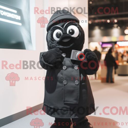 Costume Mascotte Redbrokoly De Caméra Noire Personnage Habillé D Un Manteau Et De Mitaines