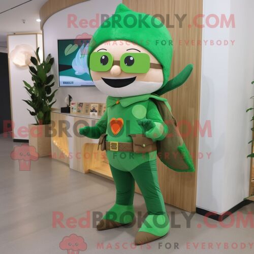 Personnage De Costume De Mascotte Redbrokoly Green Arrow Of Love Habillé Avec Un Pantalon En Velours Côtelé Et Des Montres Numériques