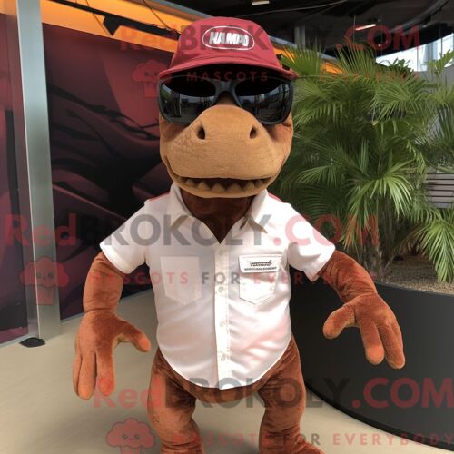 Costume Mascotte Redbrokoly De T Rex Marron Habillé Avec Une Combishort Et Des Lunettes De Soleil