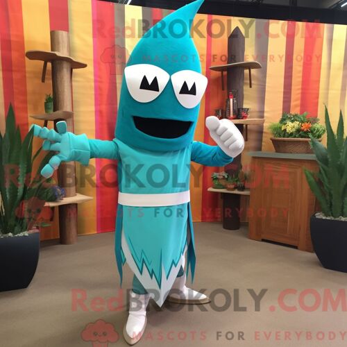 Costume De Mascotte Redbrokoly De Lanceur De Couteaux Turquoise Habillé D Une Robe Fourreau Et D Écharpes