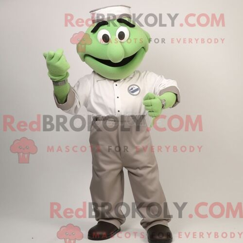 Personnage De Costume De Mascotte Redbrokoly De Montre-Bracelet Olive Habillé Avec Une Chemise En Popeline Et Des Gants