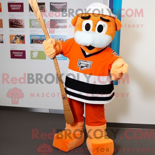Mascotte Redbrokoly De Bâton De Hockey Sur Glace Orange Personnage Habillé Avec Un Pantalon Chino Et Des Ceintures De Smoking