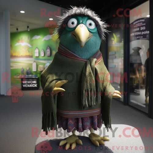 Costume Mascotte Redbrokoly De Kiwi Personnage Habillé D Un Cardigan Et De Châles