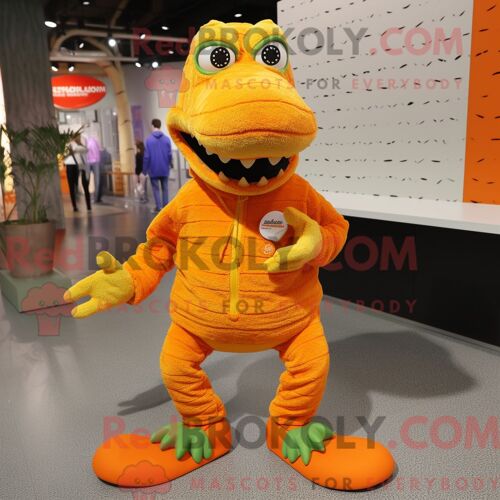Costume Mascotte Redbrokoly De Crocodile Orange Habillé D Un Pull Et De Lacets De Chaussures