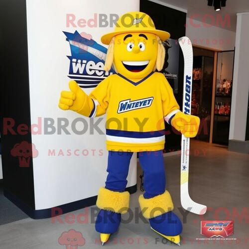 Mascotte Redbrokoly De Bâton De Hockey Sur Glace Jaune Personnage Habillé Avec Un Jean Bootcut Et Des Lacets De Chaussures