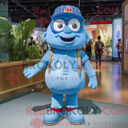 Personnage Mascotte Redbrokoly Pendentif Bleu Ciel Habillé Avec Un Short En Jean Et Des Bretelles