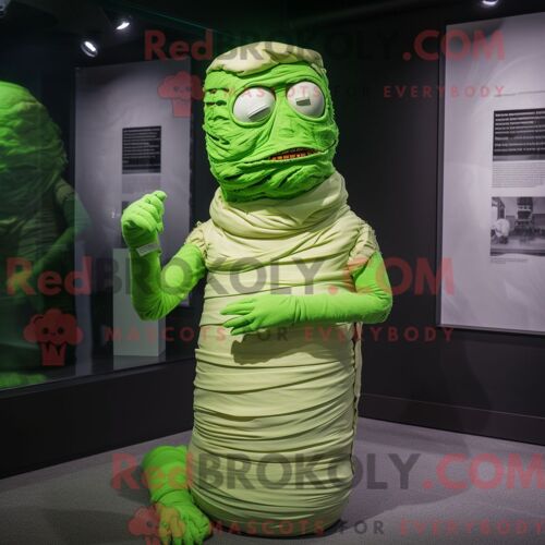 Personnage De Costume De Mascotte Redbrokoly De Momie Vert Citron Habillé Avec Une Jupe Crayon Et Des Épingles À Cravate