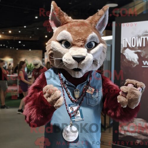 Costume De Mascotte Redbrokoly De Lynx Marron Habillé D Une Chemise Et De Colliers En Chambray