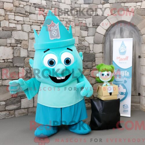 Personnage De Costume De Mascotte Redbrokoly De Château Irlandais Cyan Habillé Avec Un Jean Maman Et Des Sacs Fourre-Tout