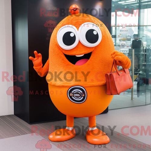 Mascotte Redbrokoly De Cyclope Orange Personnage Habillé Avec Une Jupe Circulaire Et Des Portefeuilles