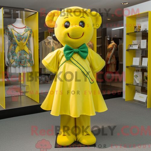 Costume Mascotte Redbrokoly De Croix Celtique Jaune Personnage Habillé D Une Robe Et De Noeuds Papillons